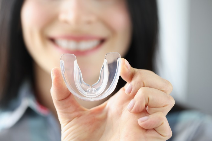 Eating and drinking tips with Invisalign aligners by Beyond Dentistry Laser Center in Brooklyn, NY